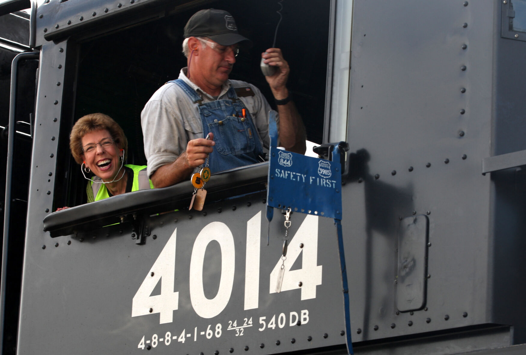 Mayor Sandy Lucy smiles from aboard No. 4014
